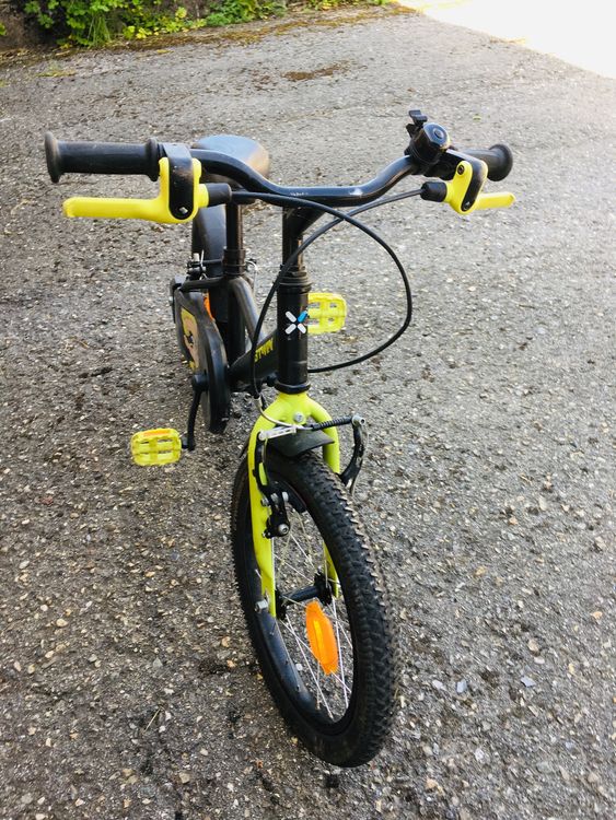 Vélo enfant VTT B'TWIN - 16 pouces équipé de suspension avant;