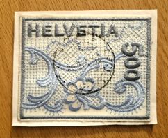 Stickereimarke gestempelt, gelaufen, Jahr 2000 auf Briefteil