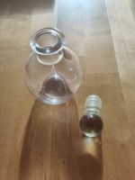 Kleines rundes Glasfläschchen
