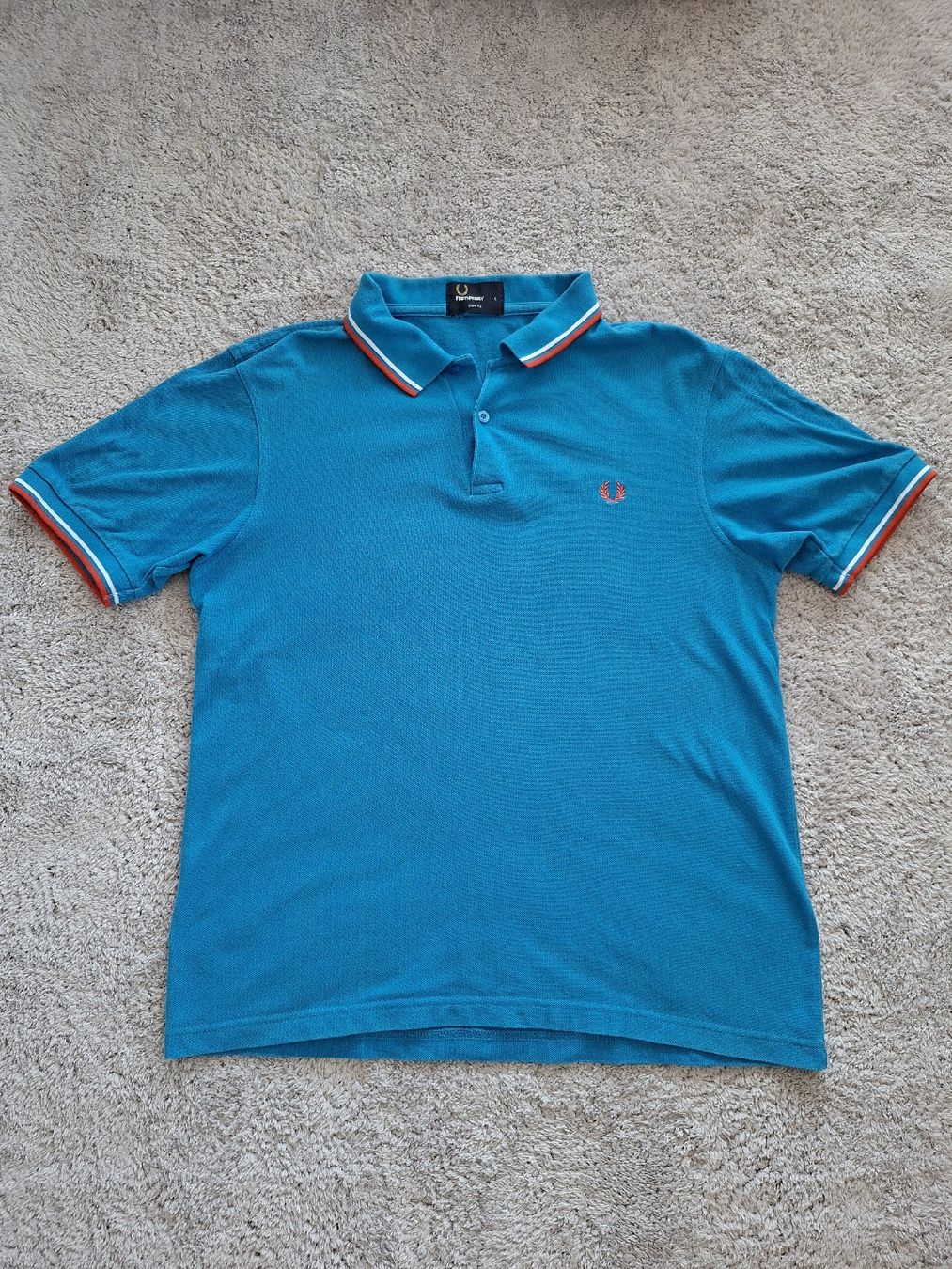 Fred Perry Magliette Polo: Polo Fred Perry bleu taille L slim – Usato da Renens VD venduto da ser_j2fn