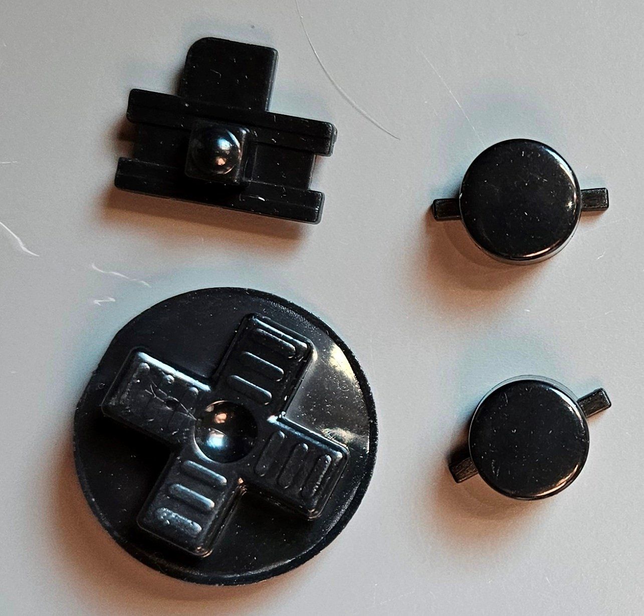 Nintendo Console: Game Boy Ersatztasten Knöpfe schwarz – Nuovo (secondo la descrizione) da Brittnau venduto da leroyjethro