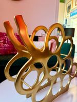 Porte-bouteilles design doré | Gold designer wine rack