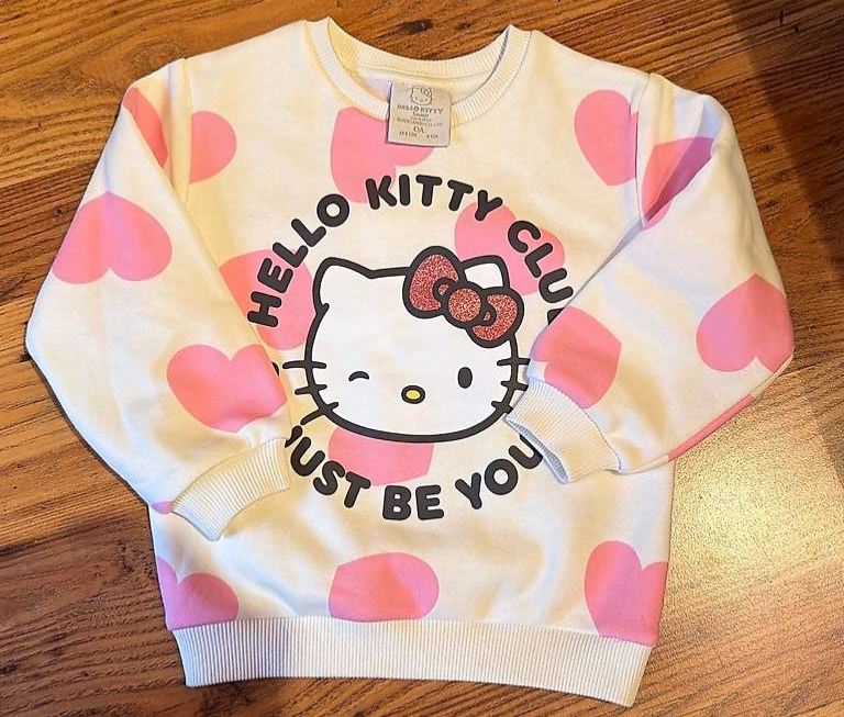 C&A Pulls et sweat-shirts: HelloKitty Pullover 104 NEU – Neuf (Voir description) à Luzern par Mariab2502