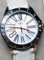 Festina Damenuhr, Quarzuhr mit weissem Lederarmband.