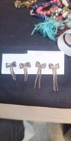 Ravissantes boucles d'oreilles vintage en forme de noeud