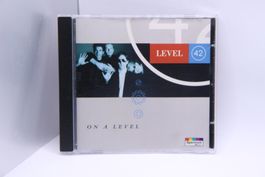 CD Level 42 - On A Level / Booklet =