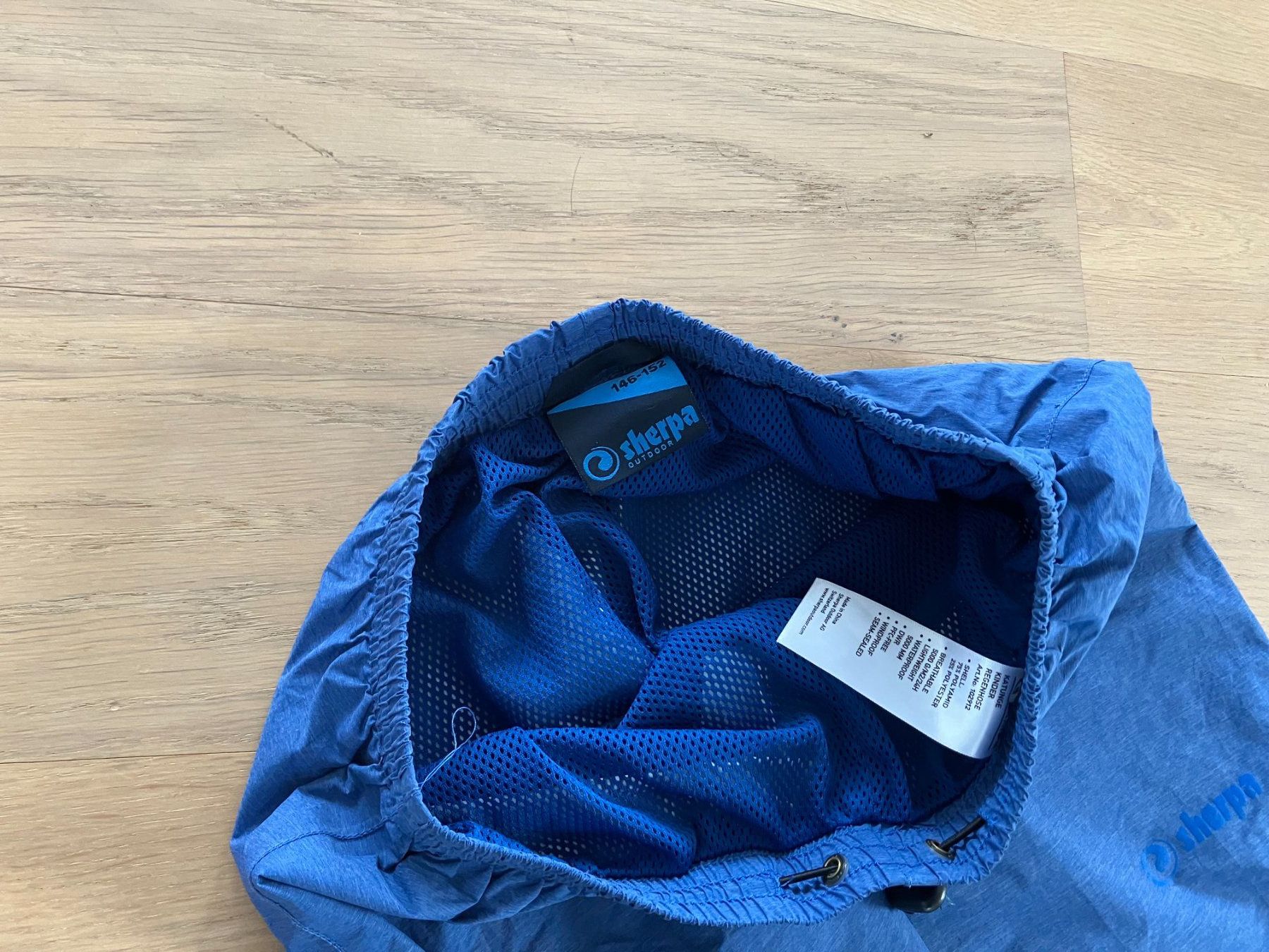 Sherpa Pantalons: Regenhose hellblau - 146/152 – D'occasion à Bern par Tante4Emma 1