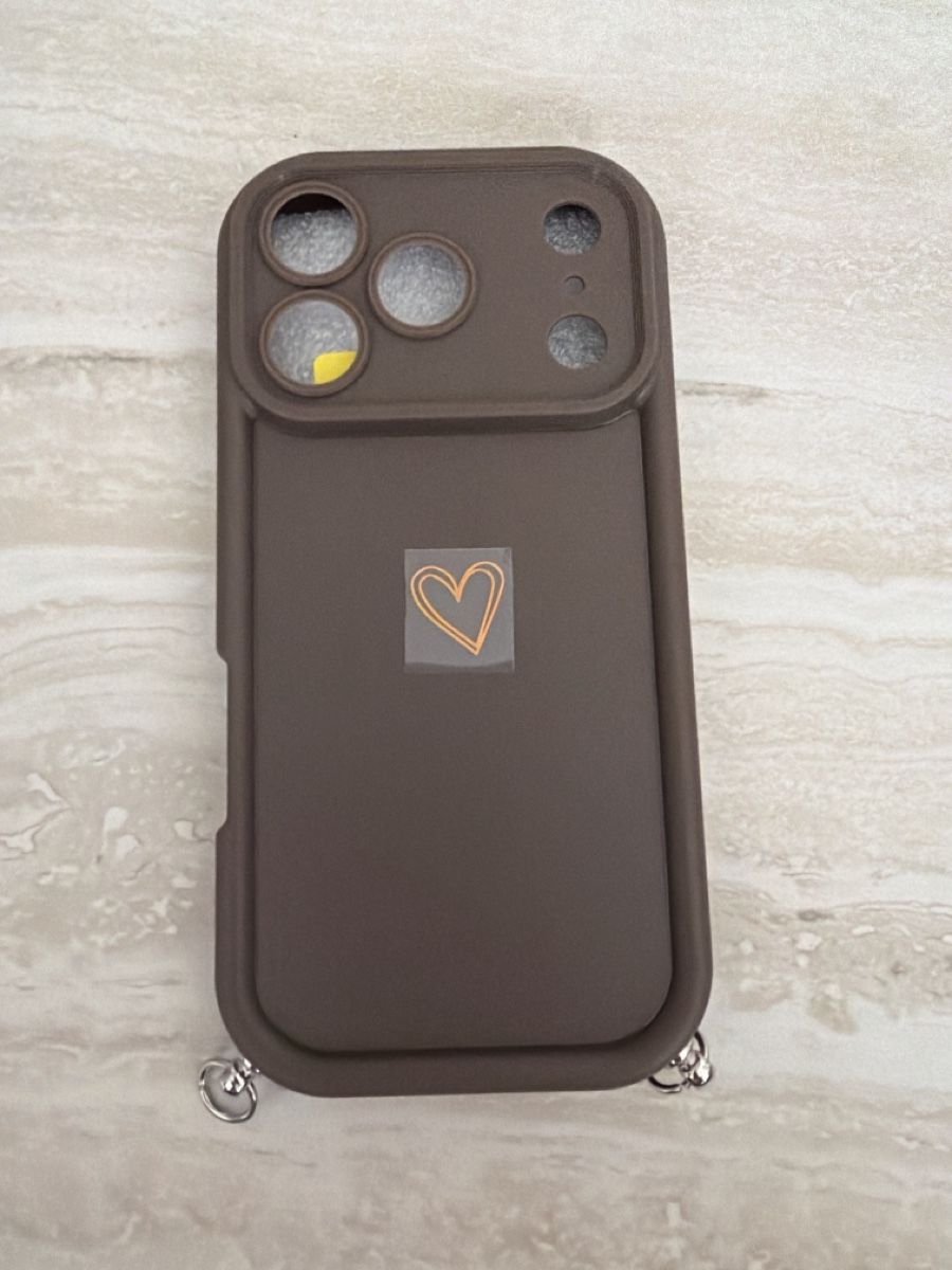Apple Cover & Protezioni schermo: iPhone17 Pro case with strap, brown & heart detail – Nuovo e nell'imballaggio originale da Paradiso venduto da Ixaya.studio 1