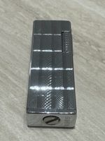 Feuerzeug Sunex silberfarben mit Muster funktionierend