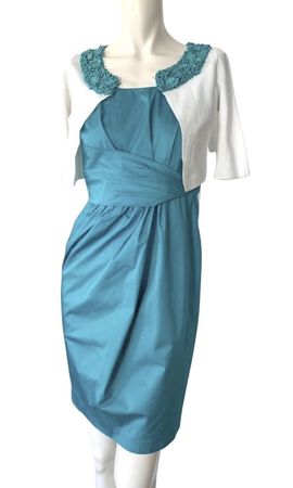 Elegante abito turchese Moschino con cardigan