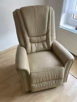 Fauteuil relax en cuir beige inclinable bon état