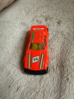 Spielzeug Auto Rennwagen Leuchtorange