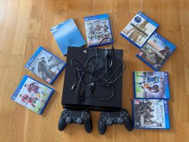 Playststion 4 + 8 Games