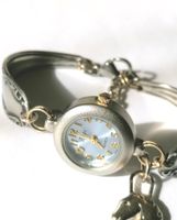 Armband aus Silber-Besteck mit Uhr