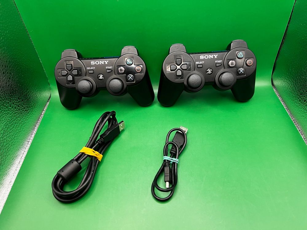 PS3 Wireless Controller schwarz (2 Stück) + Ladekabel Kaufen auf Ricardo