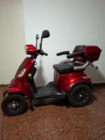 Senioren E-Mobil rot mit Stockhalter zu verkaufen