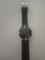 gebrauchte Rado Damenuhr schwarzes Zifferblatt Lederarmband 