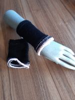 Pulswärmer schwarz mit rosa