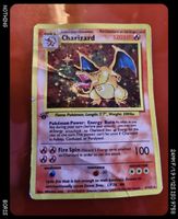 Pokémon Karte Charizard 1. Edition Holo stark gebraucht