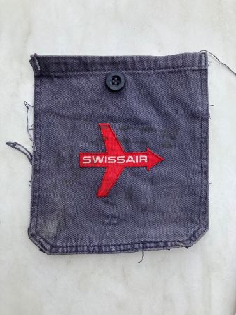 Vintage SWISSAIR Emblem auf Hosentasche,