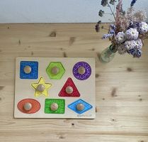 Holzpuzzle Geometrie inspiriert von Montessori