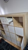 IKEA Kallax 4x4 mit weissen Türen und Schubladen