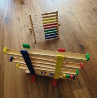 Holzspielzeug: Murmelbahn und Zählrahmen