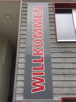 WILLKOMMEN Schild