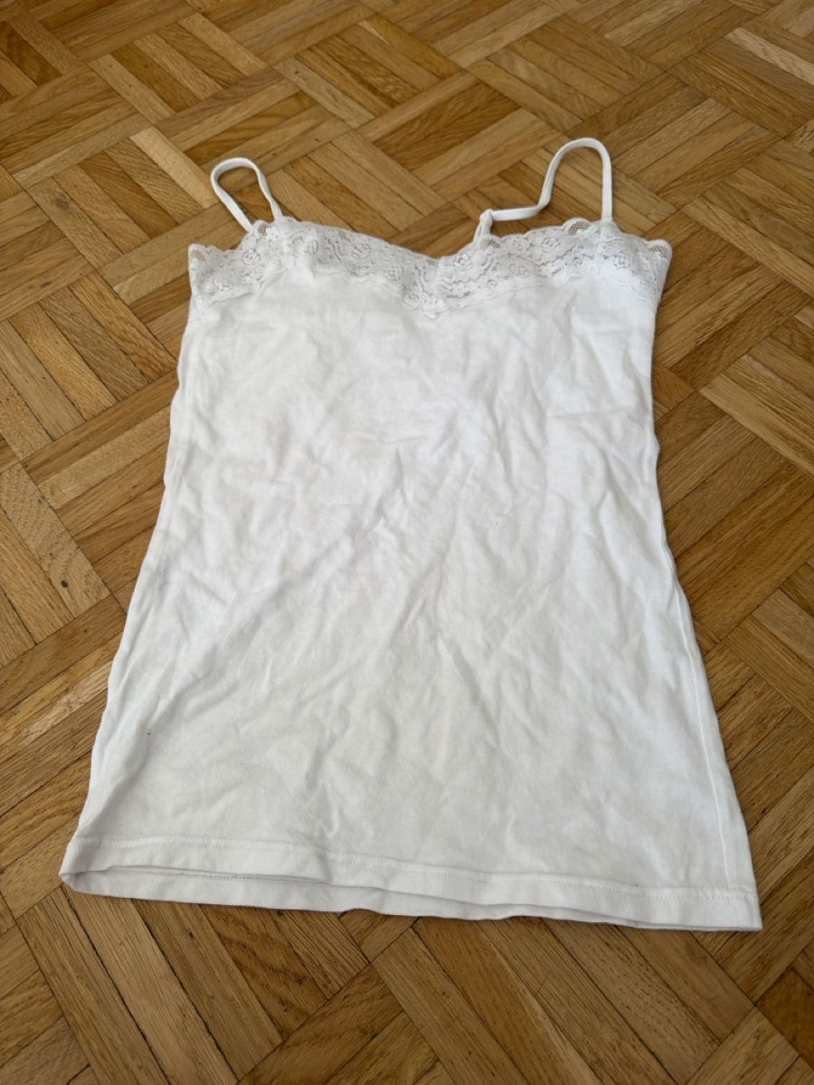 Top: Top blanc MIGROS  – Usato da Le Locle venduto da Mayd_h