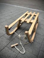 Zusammenklappbarer Schlitten
