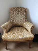 alter Stuhl mit Barockmuster 