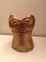 Skulptur goldene Büste, Sexy Corsage