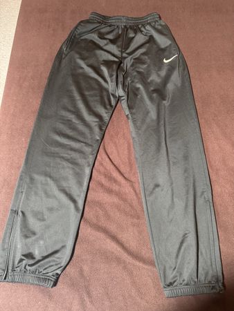 Pantalon de sport Nike noir avec fermetures taille S