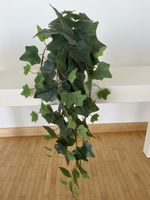 Kunstpflanze hängend
