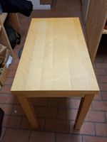 Ausnehmbarer Holztisch