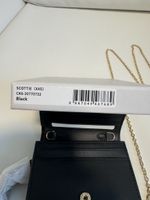 Charles & Keith Scottie ( XXS ) Wallet with Chain