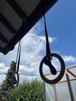 Gymnastikringe mit verstellbaren Gurten