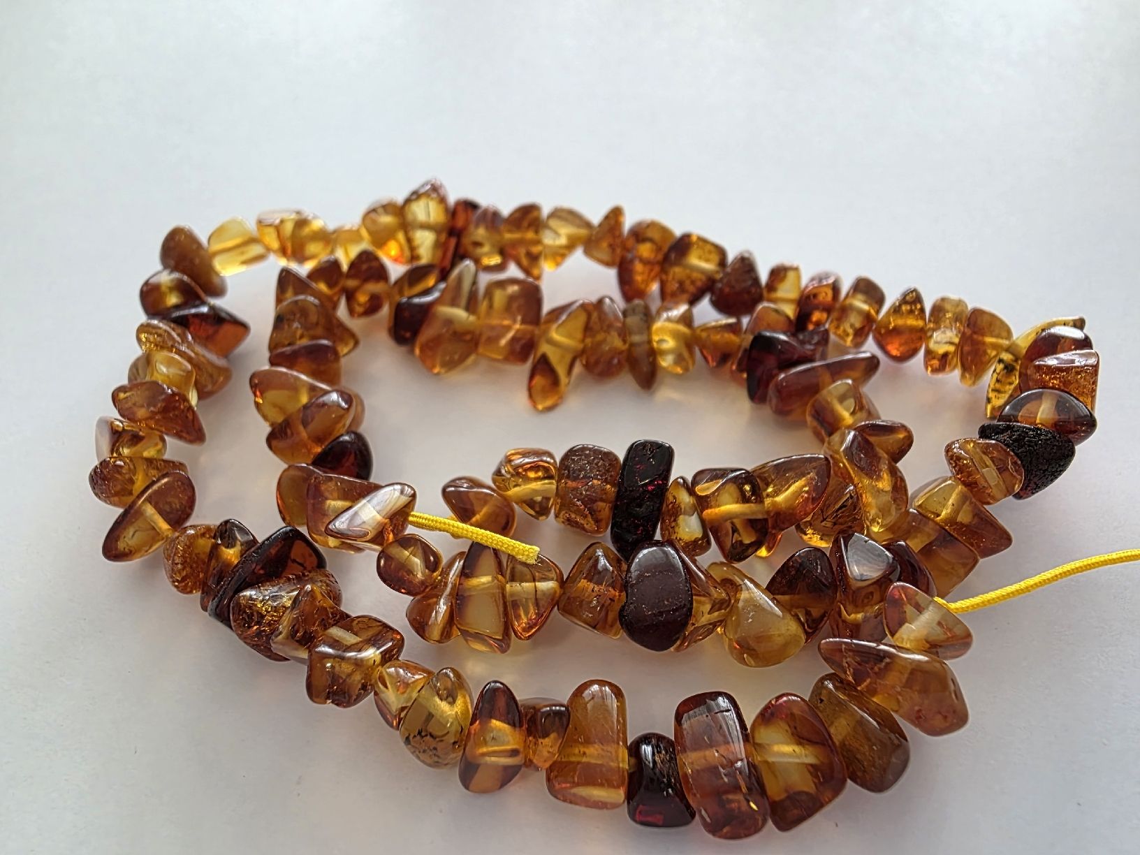 Minerali & Pietre curative: Bernstein Amber rot 5-10mm. Strang – Nuovo e nell'imballaggio originale da Menziken venduto da Mirager