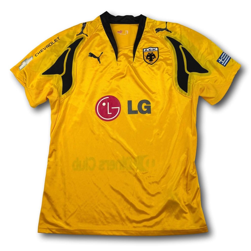 Canottiere & Pantaloni: AEK Athen - 2007-08 - Heim - XL - Puma – Usato da Bolligen venduto da ToTheJerseyEquipment