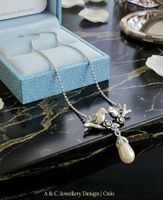 Bezaubernde Halskette mit Vögel & Perle Design - A&C neu