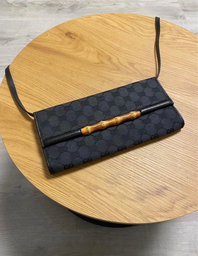 Borse da donna: Sac GUCCI Monogram Bamboo Bar Clutch – Usato da Montreux venduto da Perledor