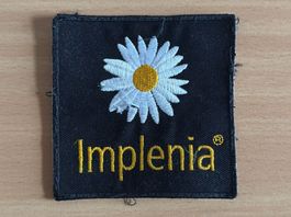 Implenia Badge