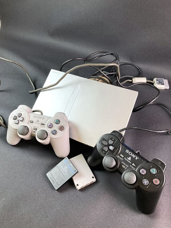 Sony Consoles: SONY | Playstation 2 Slim | 2 Controller | 2 Memo – D'occasion à Wittenbach par Restwert_St-Gallen