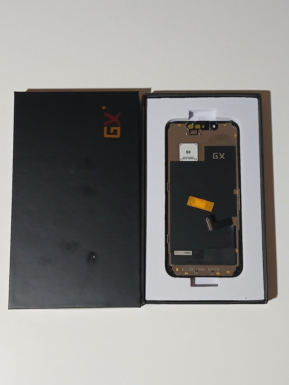 Monitor: Display Iphone 13 mini Oled GX – Nuovo e nell'imballaggio originale da Leukerbad venduto da wor_sf98 1