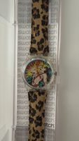 Montre Swatch vintage motif léopard et Tarzan neuve