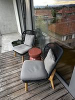 2 cane-line peakock lounge chairs outdoor