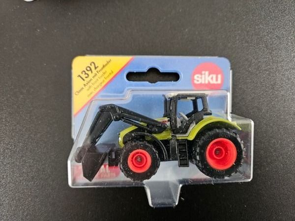 Siku Giocattoli: Neu - Siku - 1392 - Claas Axion mit Frontlader – Nuovo e nell'imballaggio originale da Dagmersellen venduto da Jarsetz_Restposten