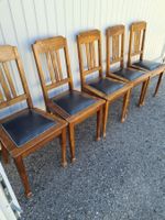 5 chaises en cuir