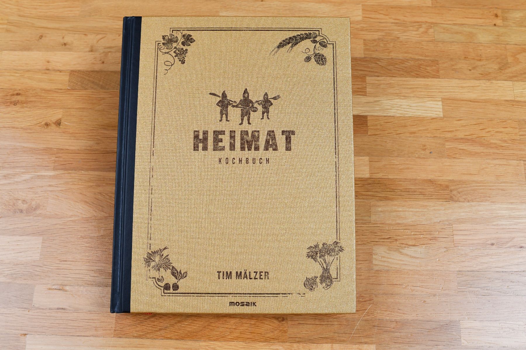 Libri: Kochbuch von Tim Mälzer "Heimat" – Nuovo (secondo la descrizione) da Bern venduto da belawoda
