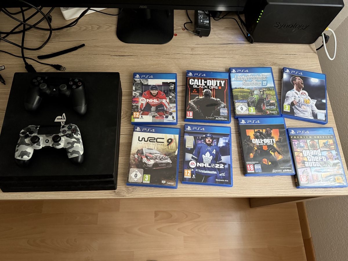 Sony Consoles: PS4 Pro mit 8 Games und 2 Controller – D'occasion à Oberbuchsiten par Leopard95